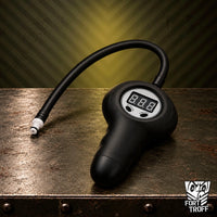 Digital Pump with Connector, black electric penis pump with digital display on a steel table, Fort Troff