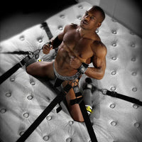 Bed Bondage molded corner anchor shown fitted under a mattress. Fort Troff.