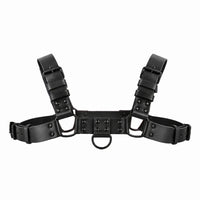 Blackout Bulldog chest harness on white, black vinyl straps with blacked-out buckles and front D-ring, Fort Troff