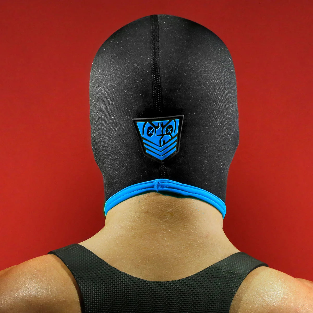 Blind Skullfuck hood rear view showing the Fort Troff shield and blue trim