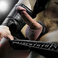 Cush Ring soft silicone cock ring worn under a leather jockstrap, close-up, Fort Troff