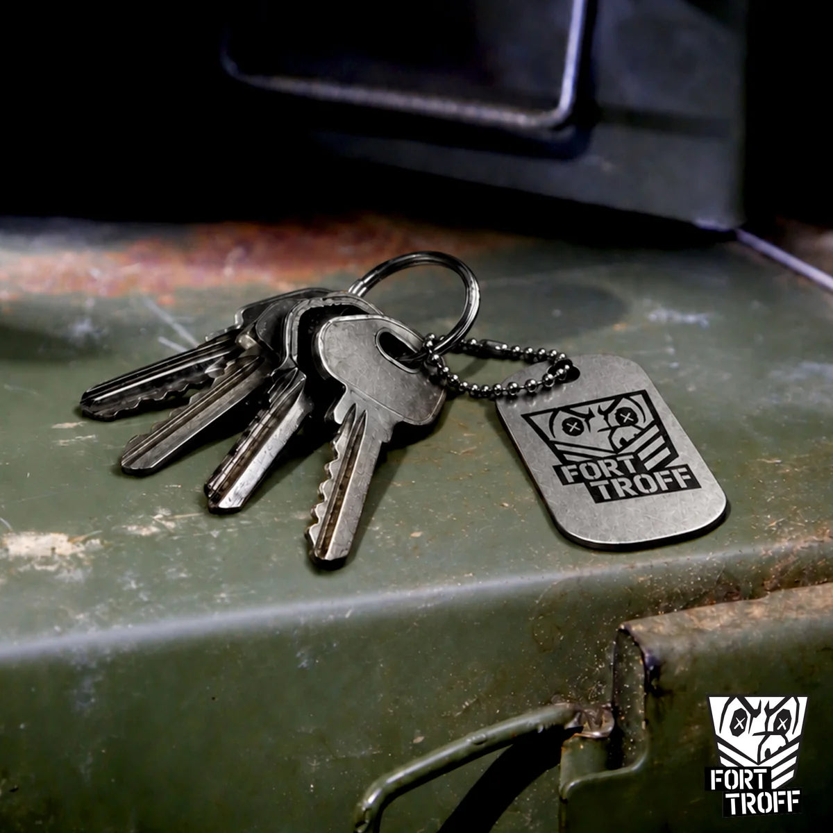FT Gear Tag on a set of keys resting on an ammo can, Fort Troff