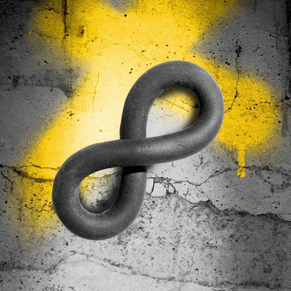 X-Wrap cock ring twisted into a figure-eight for cock and ball stretch, Fort Troff