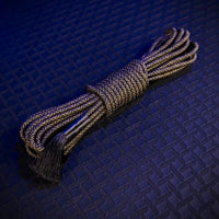 Grunt Rope 30 ft bondage rope coiled and bundled, olive-black braided polyester with tassel end, Fort Troff
