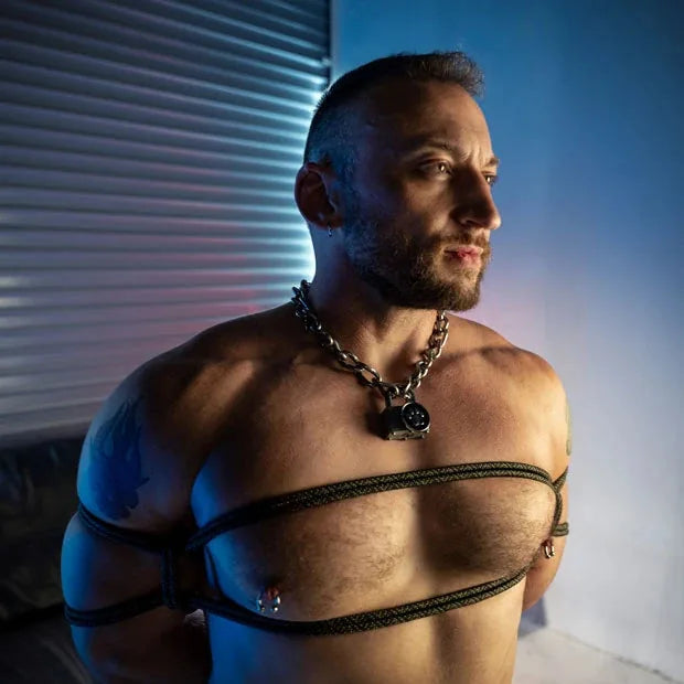 Grunt Rope chest harness tie on a bearded model in a chain collar, Fort Troff