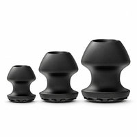 Kum Keeper Hollow Tunnel Butt Plug in Small, Medium and Large, black silicone with open tunnel tops, Fort Troff