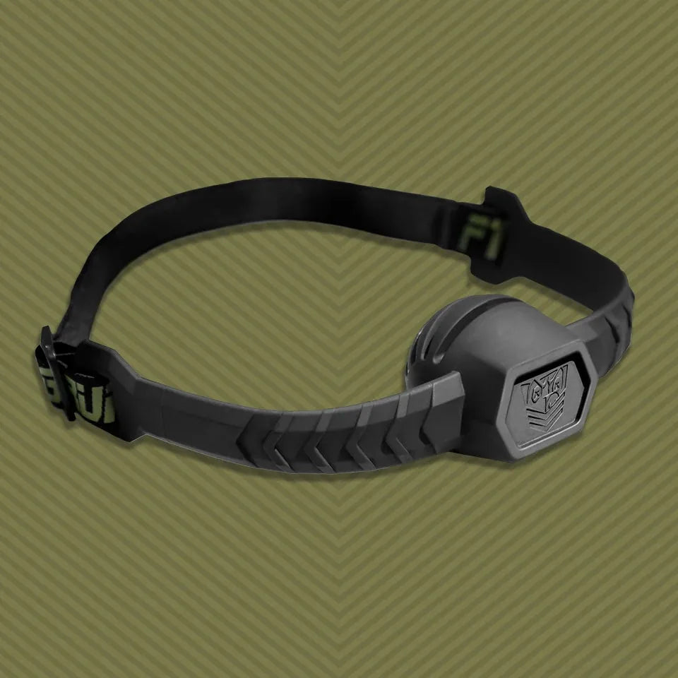 Max Comfort silicone ball gag laid out with adjustable strap and hex-logo gag, Fort Troff