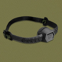 Max Comfort silicone ball gag laid out with adjustable strap and hex-logo gag, Fort Troff