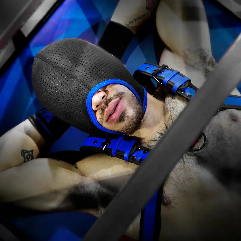 Perforated bondage hood laid flat showing the full shape. Fort Troff.