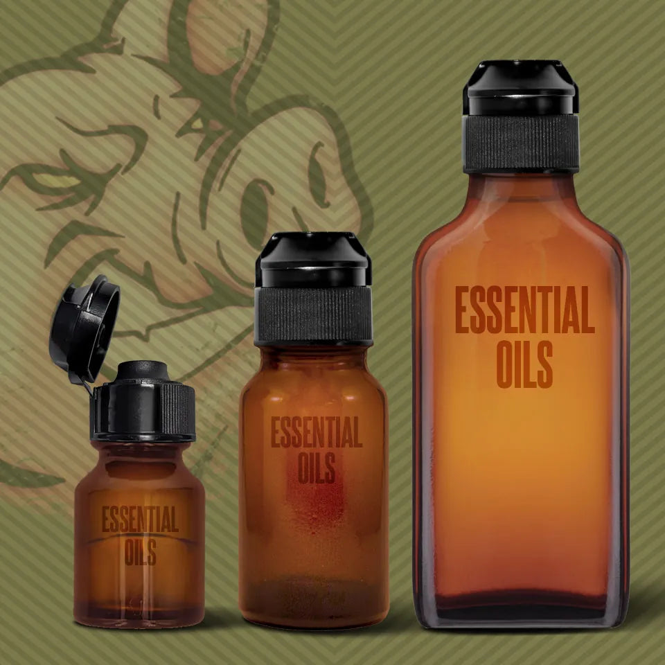 Pig Snout Flip caps on 3 sizes of essential oil bottles. Fort Troff.