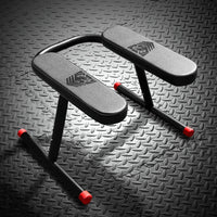 Ready Rimmer padded rim seat product shot on diamond plate, steel frame with red-capped legs, Fort Troff