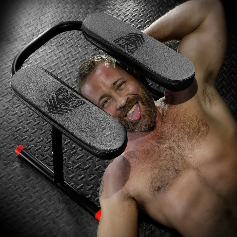 Ready Rimmer rim chair with a bearded model lying beneath the padded seat, looking up, Fort Troff