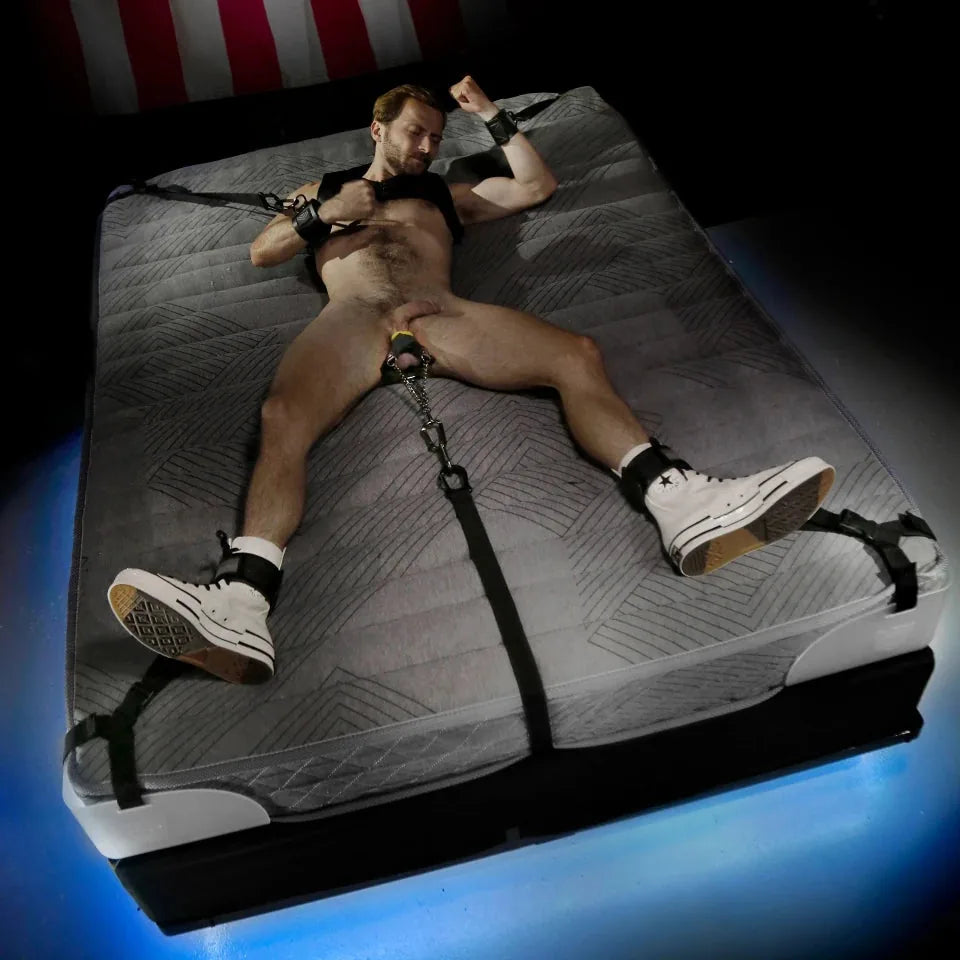 Rock Steady bed bondage system with molded anchor corners and straps. Fort Troff.