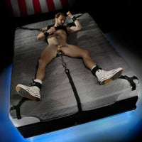 Rock Steady bed bondage system with molded anchor corners and straps. Fort Troff.