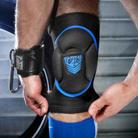 Skullfuck knee pad in blue being pulled on over the knee, Fort Troff