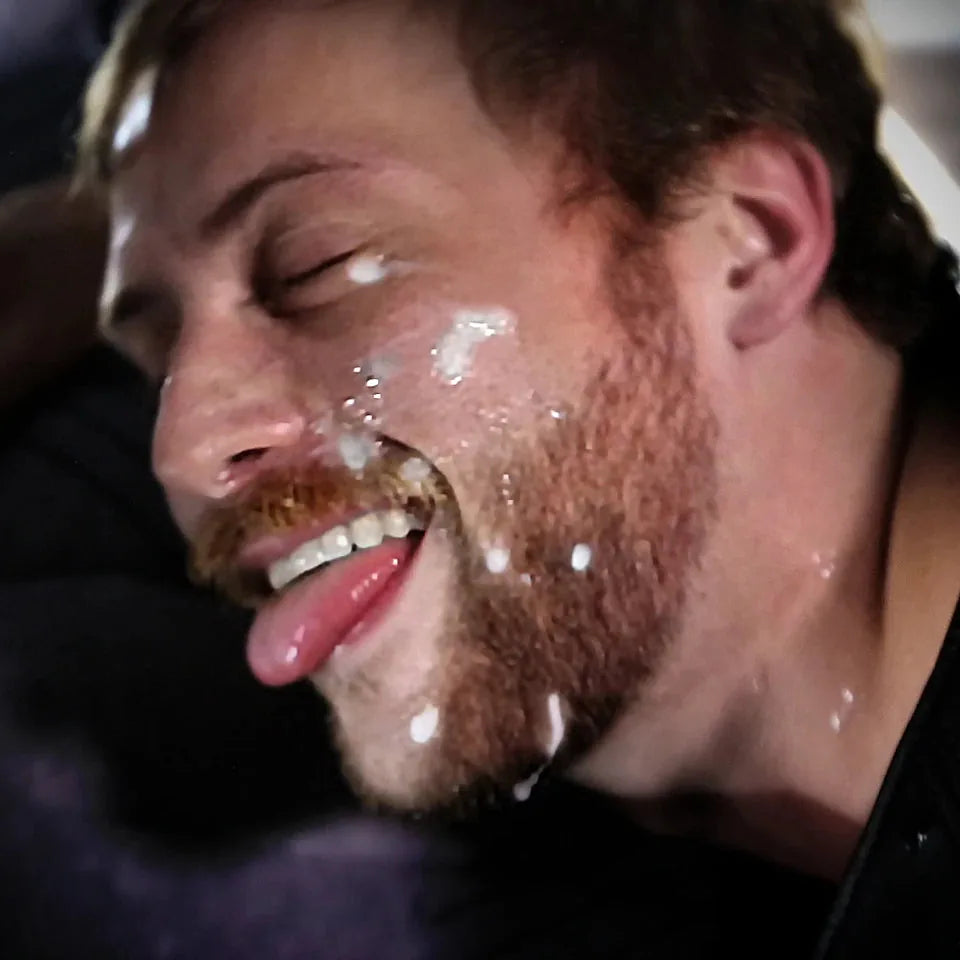 Spooge semen volume supplement lifestyle shot, bearded model's face covered in a big load, Fort Troff