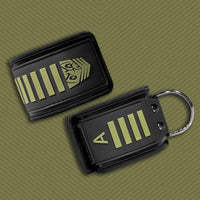 Tactical Velcro Ankle Cuffs pair stacked, black neoprene with olive stripes and steel D-ring, Fort Troff