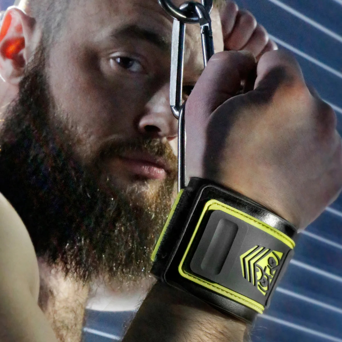 Tactical Wrist Cuffs clipped overhead, model with wrists bound above his head, Fort Troff