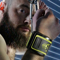 Tactical Wrist Cuffs clipped overhead, model with wrists bound above his head, Fort Troff