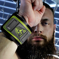 Tactical Wrist Cuff close-up on a raised fist showing the olive shield logo, Fort Troff