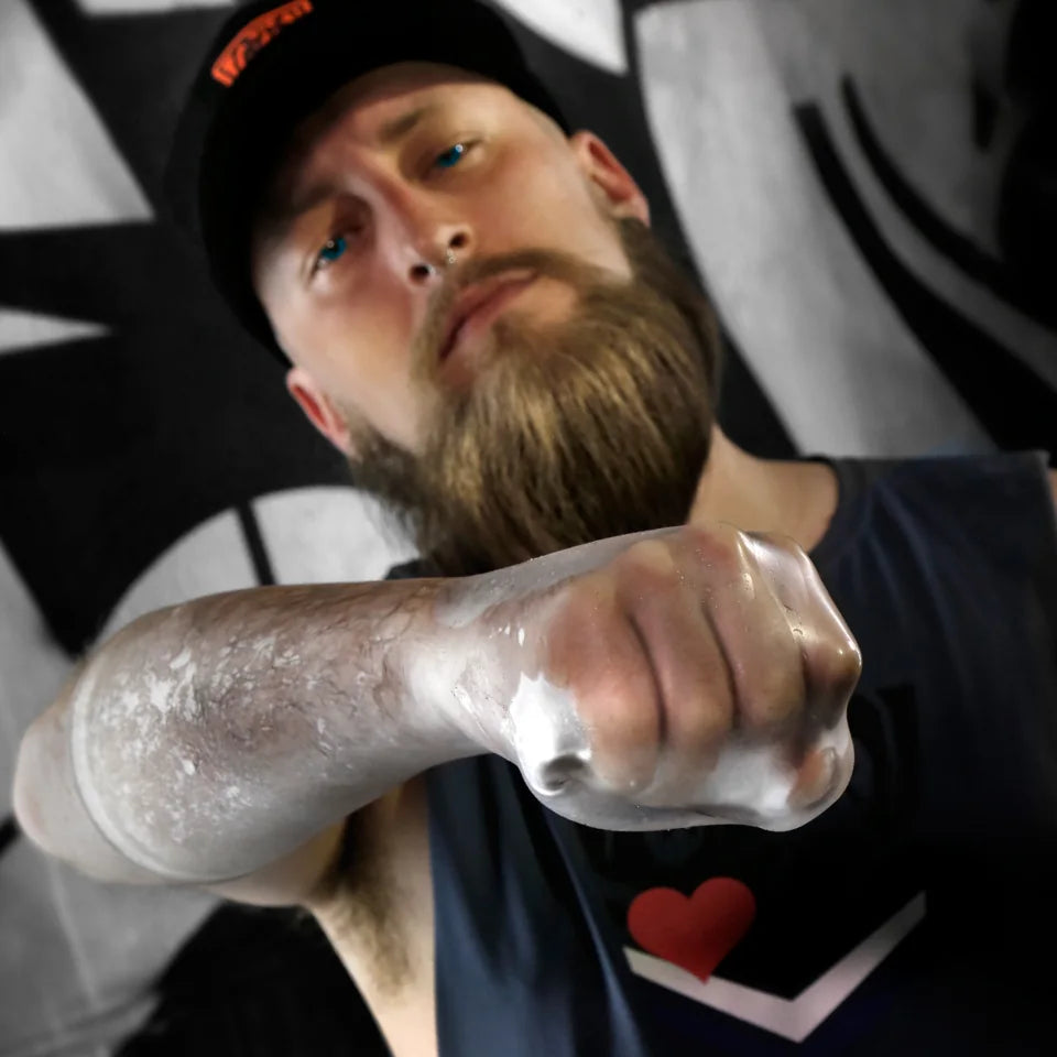 FFister XL Peek-A-Boo Clear fisting glove on an extended fist, Fort Troff