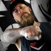 FFister XL Peek-A-Boo Clear fisting glove on an extended fist, Fort Troff