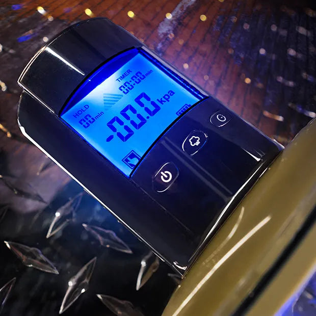 Banshee Pump Cock 'N Ball Edition digital control panel detail showing kPa pressure readout, hold mode and timer. Fort Troff.