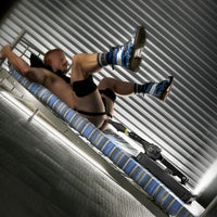 Gunner System fuck machine thrusting into a model lying on a striped mat, side view, Fort Troff
