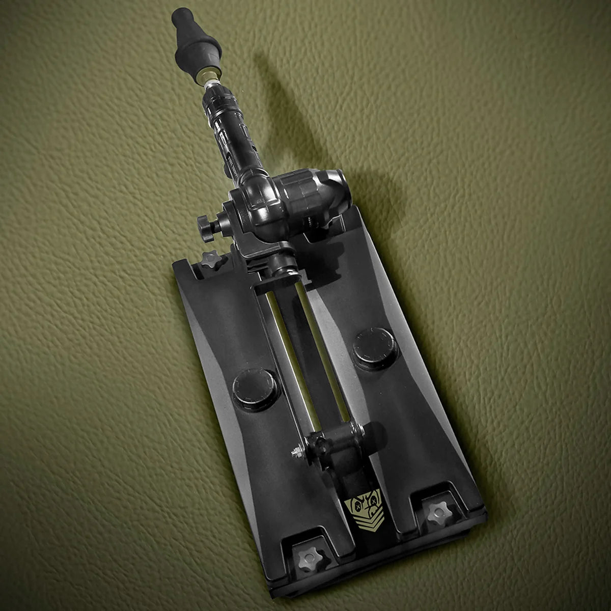 Gunner System ballast base with the machine mounted, top-down view of the rail and knobs, Fort Troff