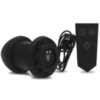 Robo Rimmer plug on its side with wireless remote and USB charging cable, Fort Troff