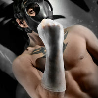 FFister Frost sleeve on a raised fist with a gas-mask model behind it, Fort Troff