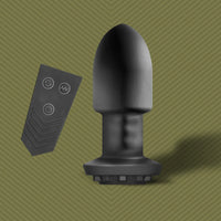 Robo Rimmer Slim vibrating plug upright next to its wireless remote, Fort Troff
